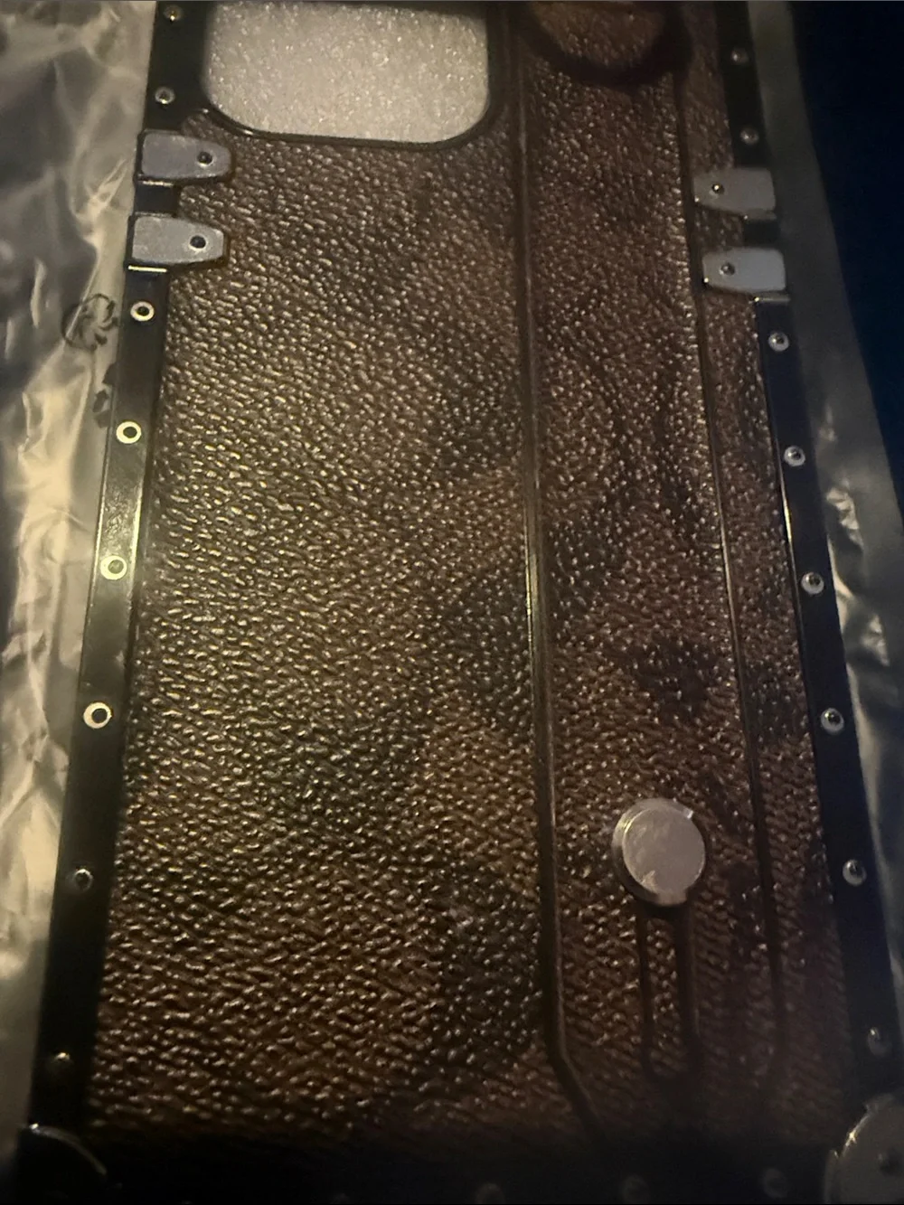 Brown Textured Trunk-Style iPhone Case with Gold Hardware